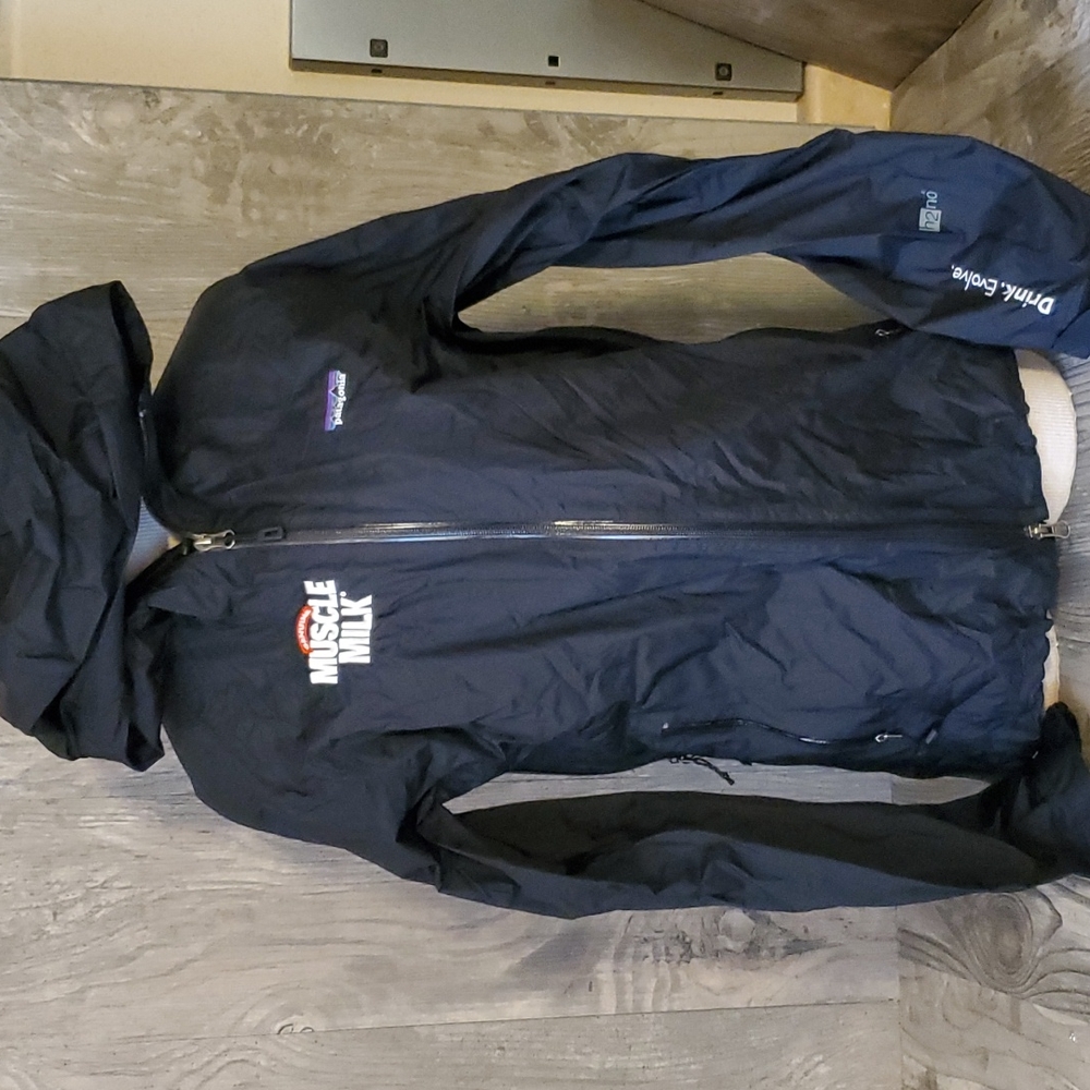 Co branded Patagonia and muscle milk jacket